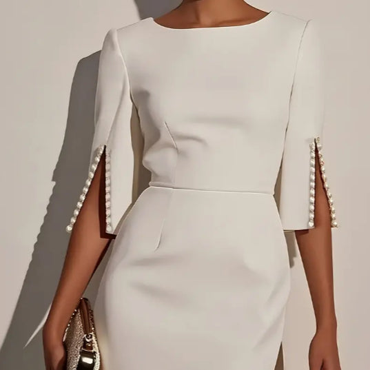 Kleid_fuer_Damen_Aus_leichtem_Material_mit_Rundhalsausschnitt_und_1
